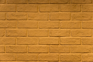 Yellow gold retro bricks wall for background design.