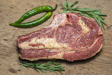 raw cowboy and cowgirl on cutting board