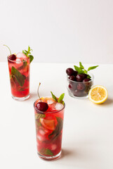 İced mint water with fresh lemon isolated on white background. Diet.