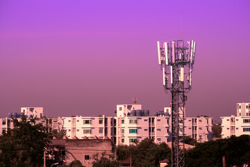 Cellular tower in town for communication with color effect.