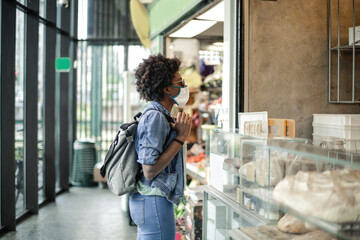 African girl in a supermarket