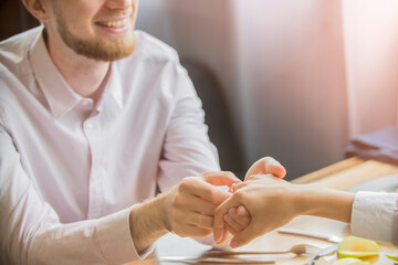 a guy on a date gives a ring to a girl