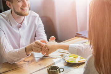 a guy on a date gives a ring to a girl