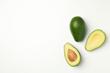 Ripe fresh avocado on white background, top view