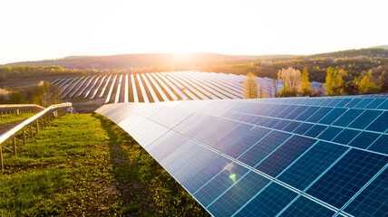 Solar panel cell on dramatic sunset sky background,clean Alternative power energy concept.