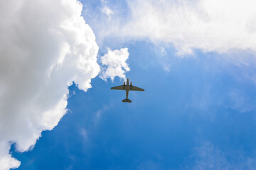 Fototapeta na wymiar airplane in the sky. aircraft in cloud. air transport for travel and cargo.