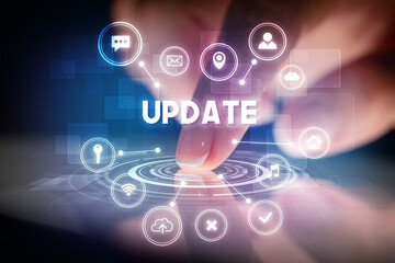 Finger touching tablet with web technology icons and UPDATE inscription, web technology concept