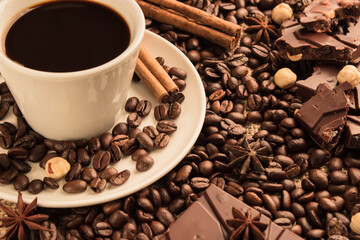 cup of coffee with sweet and spices