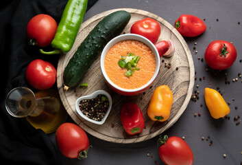 Homemade gazpacho with fresh ingredients, overhead view