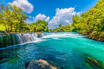 Naklejka premium Manavgat Waterfall in Turkey. It is very popular tourist attraction.