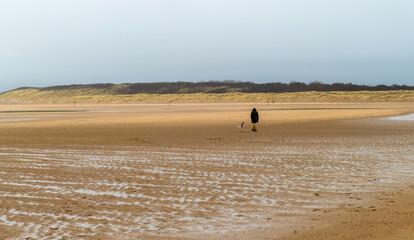 Fototapeta na wymiar Scenery at the beach on a winter day in Cadzand, Netherlands 