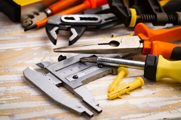 Different tools on the old background.