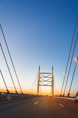 Obraz premium cable stayed bridge at sunset