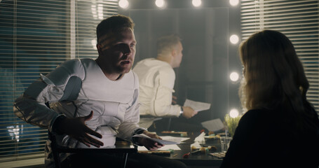 Actors rehearsing in dressing room