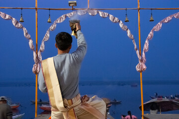 Morning aarti at Varanasi ghats on the banks of river ganges. Indian culture and religion