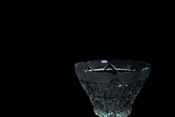 Crystal bowl on a black background