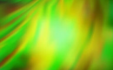 Light Green, Yellow vector blurred shine abstract background.