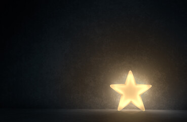 Solitary Bright Glowing Star On Dark Concrete Background.
