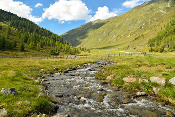 Kuhtai, Austria - June 2017. Running mountain stream in the Sellrain valley near Kuhtai
