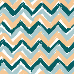 Vector seamless chevron pattern hand painted with bold brushstrokes in multiple colors: aqua, forest green and yellow.