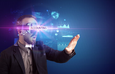 Businessman looking through Virtual Reality glasses with ACCOUNTING inscription, new business concept