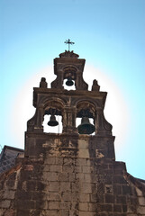 Three bells in the belfry of the old Church in the Mediterranean