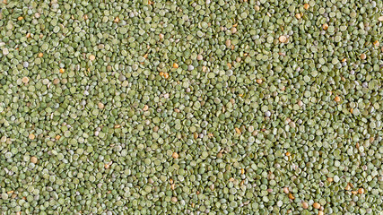 Green dry chopped peas. Background of peas. Food banner.