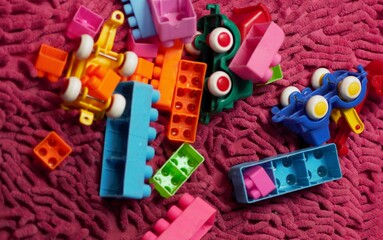 colored brick toys isolated pink background