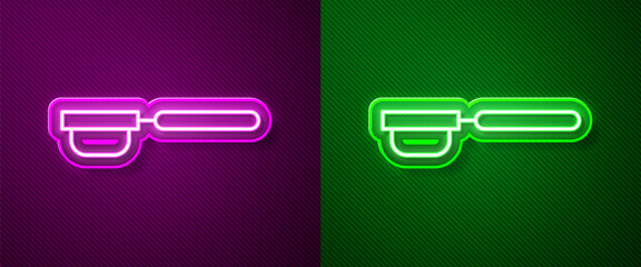Glowing neon line Coffee filter holder icon isolated on purple and green background. Vector Illustration.