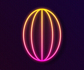 Glowing neon line Rugby ball icon isolated on black background. Vector Illustration.