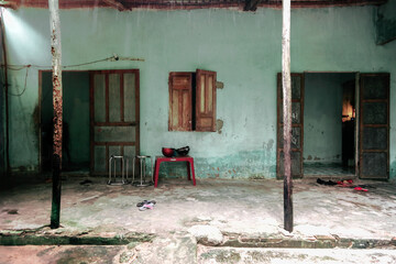 View from the lake of a boat anchored next to a Vietnamese house in Hoi An, Vietnam