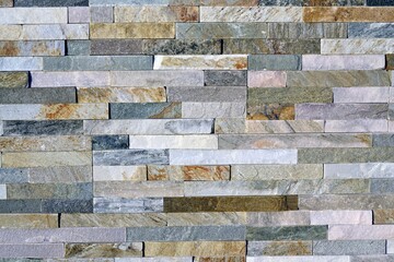 real stone wall pattern with very diverse colors and patterns