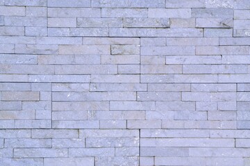 real wall pattern in very geometric stone