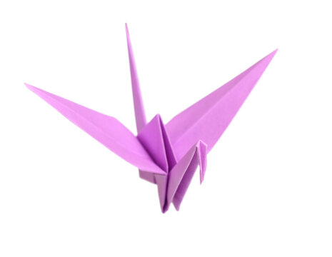Origami bird over white