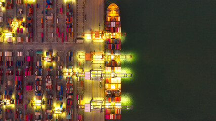 Container , container ship in export and import business and logistics. Shipping cargo to harbor by crane. Water transport International. Aerial view and top view.