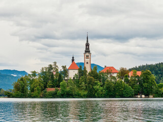 Fototapeta na wymiar Bled island landscape with Pilgrimage Church of the Assumption of Maria on Bled lake, Bled, Slovenia