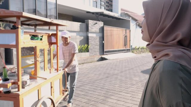 man selling bakso in the carts. indonesia street food. small business entrepreneur