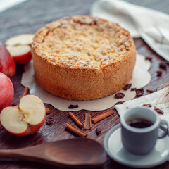 Homemade delicious apple pie with different ingredients on rustic background. Classic autumn Thanksgiving dessert - organic apple pie.