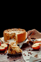 Homemade delicious apple pie with different ingredients on rustic background. Classic autumn Thanksgiving dessert - organic apple pie.