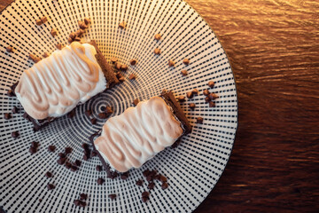 Fresh chocolate brownies with melted marshmallow frosting and chocolate chips