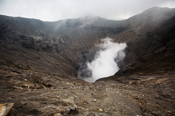 View to caldera of Bromo volcano on cloudy day, Java, Indonesia
