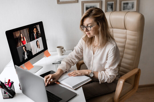 Video conference. Manager hold a business meeting on a computer from home