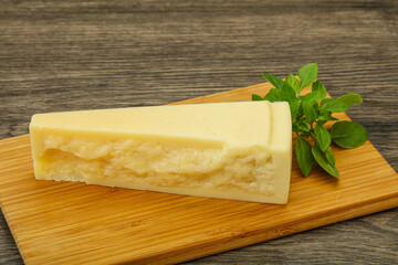 Hard parmesan cheese served basil