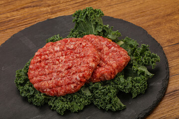Raw beef burger cutlet for cooking