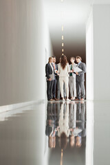 Business people meeting in corridor