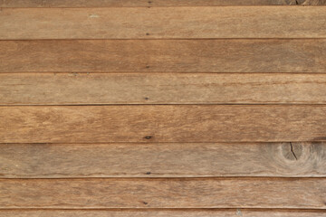 Close-up horizontal stripes of wood plank brown texture background