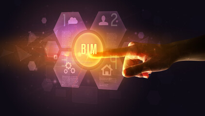 Hand touching BIM inscription, new technology concept