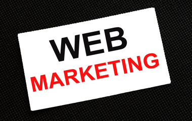 White card on the black background with text Web Marketing
