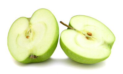 two half of green apple isolated over white background