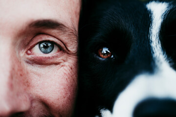 Close-up portrait of a man with his dog